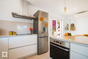 Kuchyňa alebo kuchynka v ubytovaní Villa Pura Vida by Abahana Villas + 25 fotografií