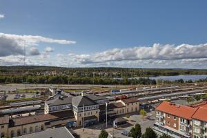 an aerial view of a town with a train station at Hotell Högland in Nässjö