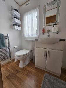 Kúpeľňa v ubytovaní Vacanza Static Caravan