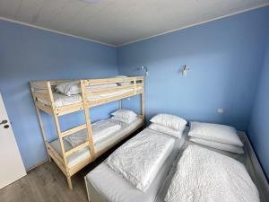 Ein Bett oder Betten in einem Zimmer der Unterkunft Cabin in Faukás, west part of Iceland - Birta Rentals