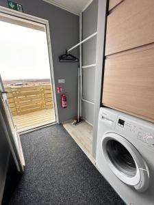 Ванная комната в Cabin in Faukás, west part of Iceland - Birta Rentals