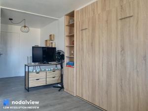 TV a/nebo společenská místnost v ubytování Men Er Mor