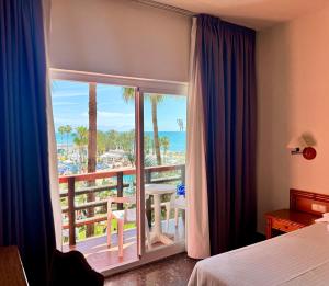 Postel nebo postele na pokoji v ubytování Hotel MS Tropicana