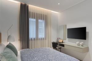 Ένα ή περισσότερα κρεβάτια σε δωμάτιο στο Patra Elegant Residence