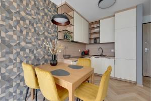 Kuchyň nebo kuchyňský kout v ubytování Garnizon by Comfort Apartments