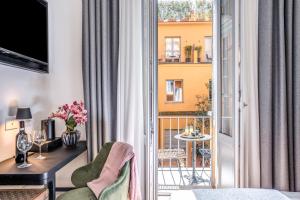 Postel nebo postele na pokoji v ubytování Residenza Piranesi Boutique Hotel