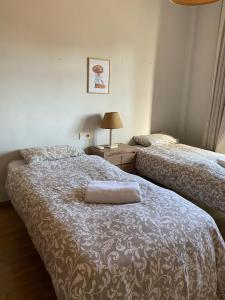 Postel nebo postele na pokoji v ubytování Apartamentos Turísticos Spiritmar