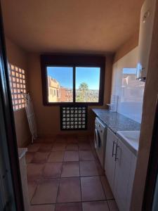 Kuchyň nebo kuchyňský kout v ubytování Apartamentos Turísticos Spiritmar