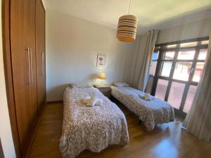 Postel nebo postele na pokoji v ubytování Apartamentos Turísticos Spiritmar