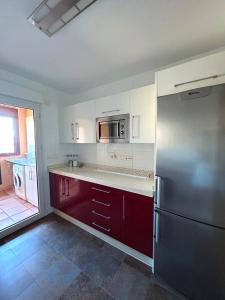 Kuchyň nebo kuchyňský kout v ubytování Apartamentos Turísticos Spiritmar