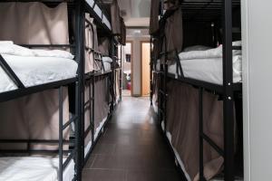 Posteľ alebo postele v izbe v ubytovaní Hostel Mandarinka
