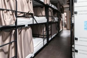 Poschodová posteľ alebo postele v izbe v ubytovaní Hostel Mandarinka