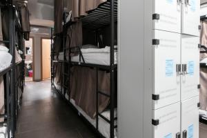 Poschodová posteľ alebo postele v izbe v ubytovaní Hostel Mandarinka