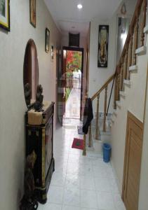 a hallway of a house with a staircase and a door at فيلا رائعه في الساحل الشمالي مارينا 6 اطلاله بحر in El Alamein