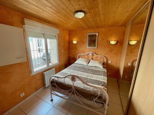 Postel nebo postele na pokoji v ubytování Maison de la Plage