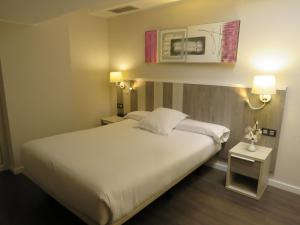 Cama o camas de una habitación en Hotel La Palma de Llanes