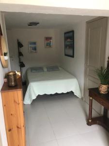 Posteľ alebo postele v izbe v ubytovaní Appartement dans la colline + 16 fotografií