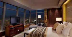 A television and/or entertainment centre at The Ritz-Carlton, Hong Kong
