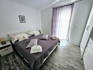Postel nebo postele na pokoji v ubytování Guest House Antonia