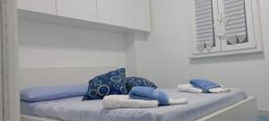 Postel nebo postele na pokoji v ubytování IL RE TRITONE