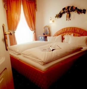 Postel nebo postele na pokoji v ubytování Apartment Grattschlössl