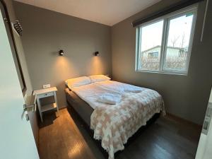 Postel nebo postele na pokoji v ubytování Apartment Skógafoss