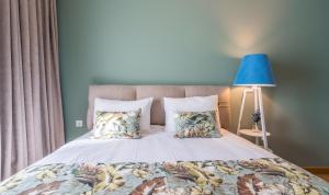 Ένα ή περισσότερα κρεβάτια σε δωμάτιο στο New Gudauri Ski4Life