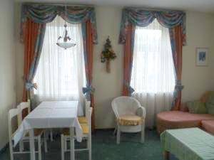 Postel nebo postele na pokoji v ubytování Apartment Grattschlössl
