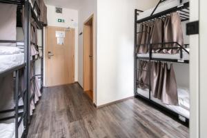 Posteľ alebo postele v izbe v ubytovaní Hostel Mandarinka