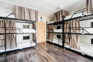 Posteľ alebo postele v izbe v ubytovaní Hostel Mandarinka