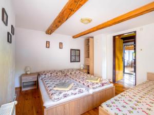 Postel nebo postele na pokoji v ubytování Holiday Home Horní Prysk by Interhome