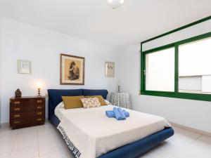 Postel nebo postele na pokoji v ubytování Apartment Mediterrani-4 by Interhome