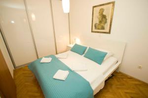 Katil atau katil-katil dalam bilik di Apartment Maida