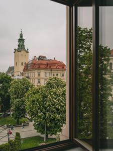 a view of a building from a window at Grand Hotel Lviv Casino & Spa in Lviv