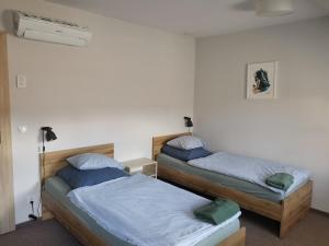 Posteľ alebo postele v izbe v ubytovaní Bemma Apart Hostel
