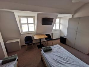 Posteľ alebo postele v izbe v ubytovaní Bemma Apart Hostel