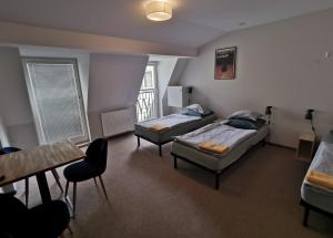 Posteľ alebo postele v izbe v ubytovaní Bemma Apart Hostel