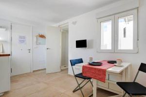 TV a/nebo společenská místnost v ubytování Apartamentos ALAZUL Extramuros