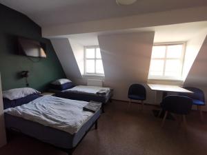 Posteľ alebo postele v izbe v ubytovaní Bemma Apart Hostel