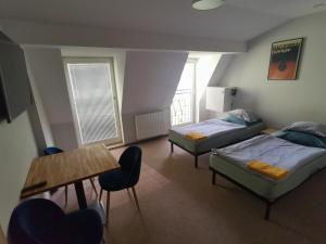 Posteľ alebo postele v izbe v ubytovaní Bemma Apart Hostel