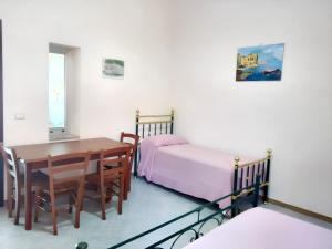 Postel nebo postele na pokoji v ubytování Studio with furnished terrace at Formicola