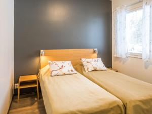 Postel nebo postele na pokoji v ubytování Holiday Home Vuokatinranta suite 2 b by Interhome + 13 fotografií