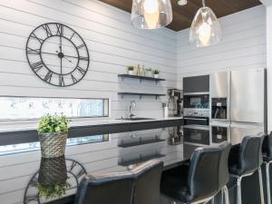 Η κουζίνα ή μικρή κουζίνα στο Holiday Home Naava kaarna spa by Interhome