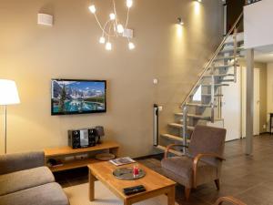 TV a/nebo společenská místnost v ubytování Holiday Home Vuokatinranta suite 2 a by Interhome + 12 fotografií