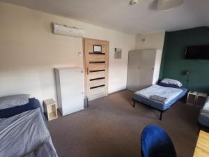 Posteľ alebo postele v izbe v ubytovaní Bemma Apart Hostel