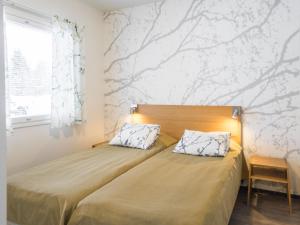 Postel nebo postele na pokoji v ubytování Holiday Home Vuokatinranta suite 4 b by Interhome + 17 fotografií