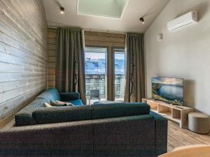 Postel nebo postele na pokoji v ubytování Holiday Home Uniikki 75- c402 by Interhome