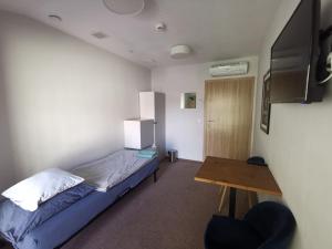 Posteľ alebo postele v izbe v ubytovaní Bemma Apart Hostel
