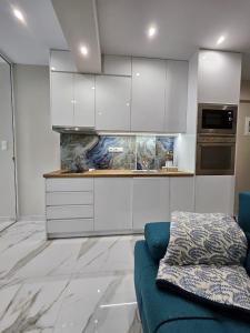 Kuchyň nebo kuchyňský kout v ubytování AGORA luxury APARTMENT 7 + 10 fotografií