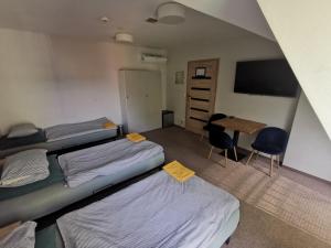 Posteľ alebo postele v izbe v ubytovaní Bemma Apart Hostel